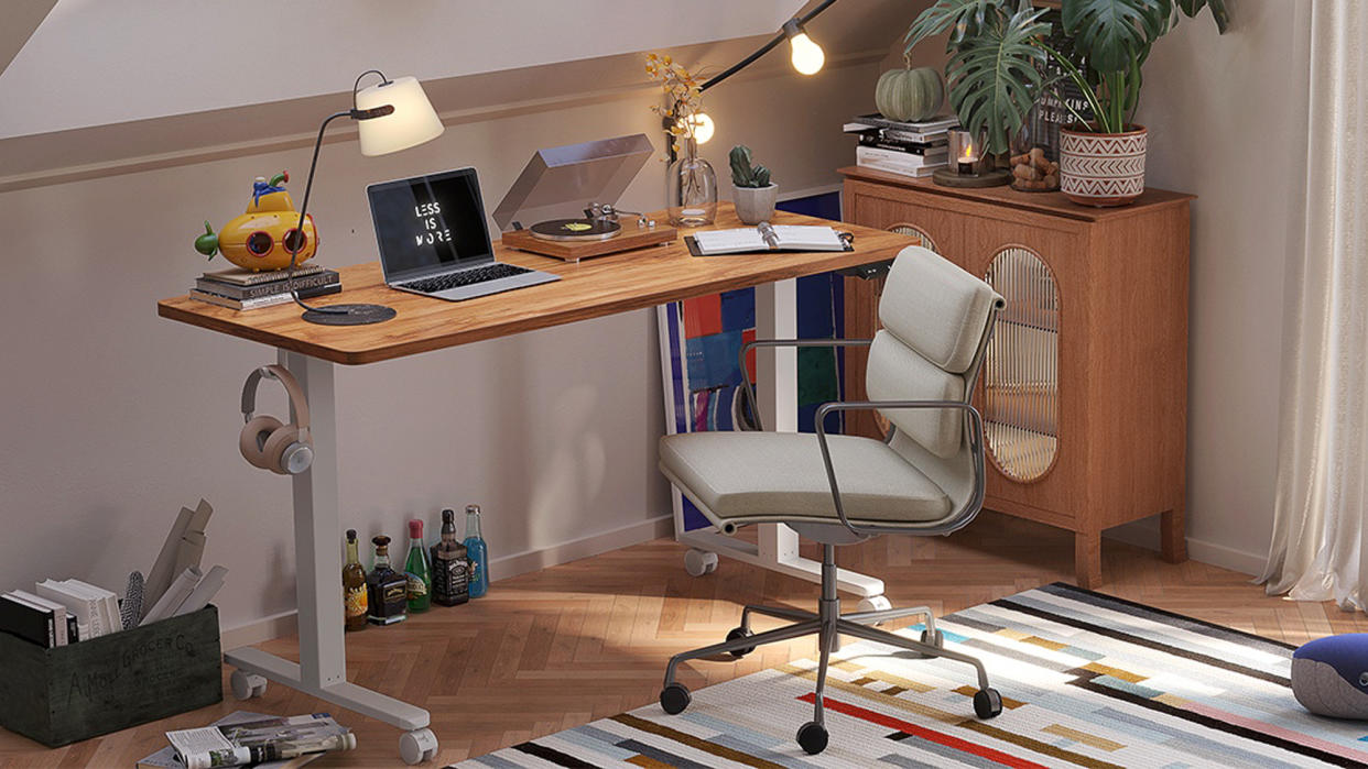  Fezibo Electric Standing Desk in bedroom. 