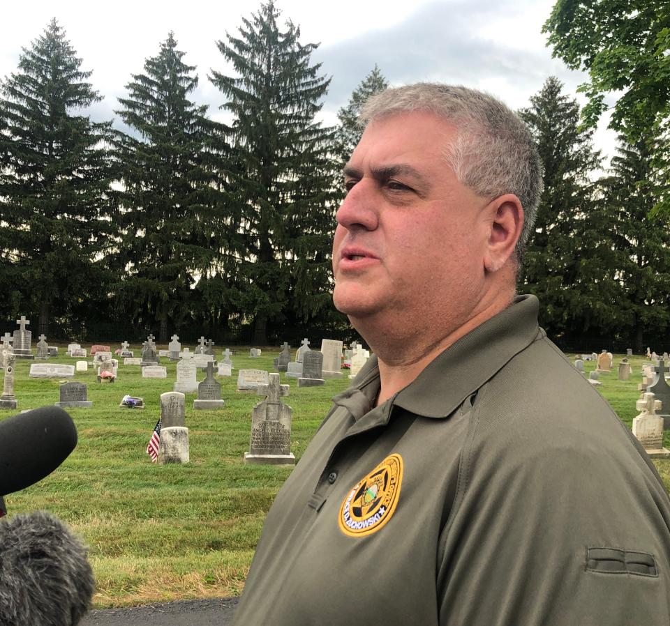 Portage County Chief Deputy Ralph Spidalieri talks to reporters after authorities exhumed the body of Kathryn Menendez, an Alliance area girl, on Tuesday, June 25, 2024. She was killed in 1994 and her body was found in Portage County.