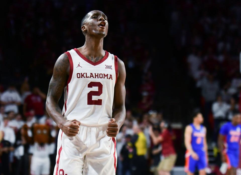 Oklahoma guard Umoja Gibson celebrates the team's win over Florida in an NCAA college basketball game in Norman, Okla., Wednesday, Dec. 1, 2021. (AP Photo/Kyle Phillips)