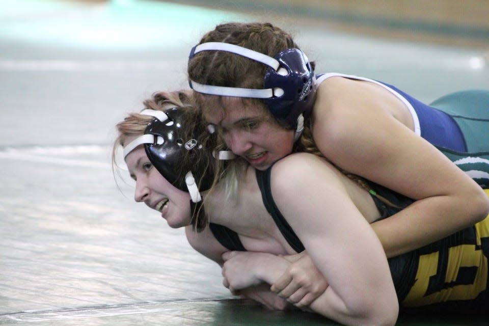 Pictured here is Mckeel's Maranda Borglund competing against George Jenkins' Anna Murawski in the first-ever girls districts. McKeel Academy dominated the competition in districts Wednesday, Feb. 9 at George Jenkins High School. Courtesy photo.