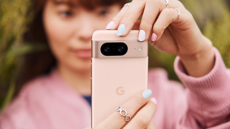 Google Pixel 8 Rose handheld lifestyle press image