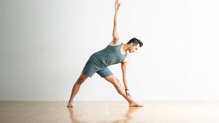 Man in Extended Triangle Pose