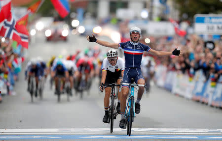 Benoit Cosnefroy (R) from France finishes first and Lennard Kamna (L) from Germany second in UCI Cycling Road World Championships Men Under 23 in Bergen, Norway September 22, 2017. NTB Scanpix/Cornelius Poppe via REUTERS