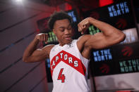 Toronto Raptors' Scottie Barnes poses for a photograph at Scotiabank Arena during the NBA basketball team's media day in Toronto, Monday, Sept. 27, 2021. (Cole Burston/The Canadian Press via AP)