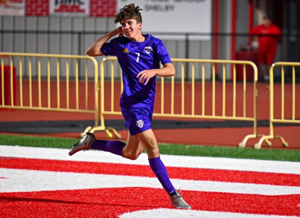 Lexinton's Jack Hiebel celebrates after he scored the game's only goal in a 1-0 win over Ontario on Monday night in the Division II district championship match.