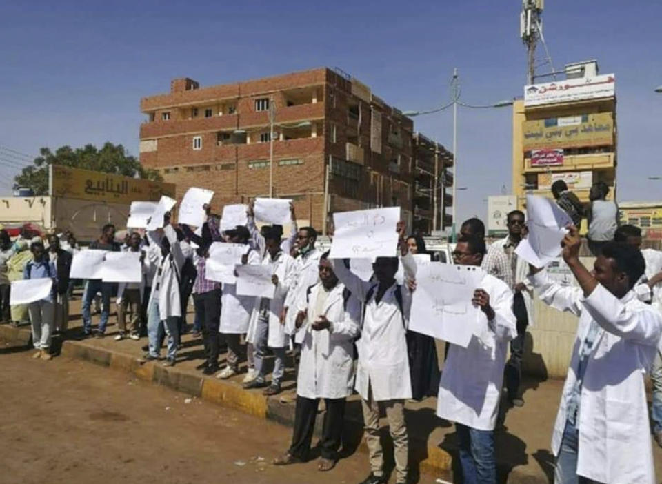 In this Saturday, Dec. 22, 2018 handout photo provided by a Sudanese activist, Omdurman Islamic University students hold a demonstration in Khartoum, Sudan. The protest was one in a series of anti-government protests across Sudan, initially sparked by rising prices and shortages. (Sudanese Activist via AP)