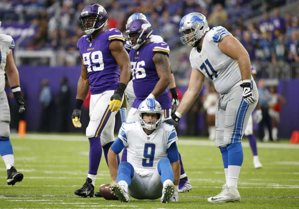 Matthew Stafford was on his backside for much of Sunday’s blowout loss at Minnesota. (AP/Bruce Kluckhohn)