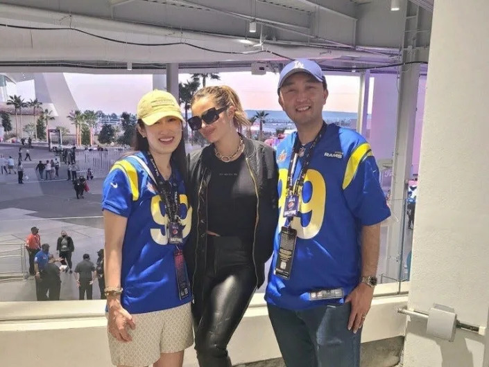 Angela Kim with her husband and Addison Rae at the Super Bowl.