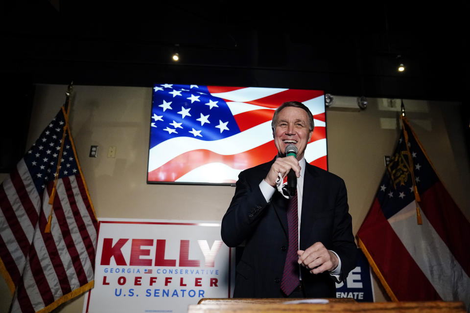 Republican candidate for U.S. Senate Sen. David Perdue speaks during a campaign rally on Friday, Nov. 13, 2020, in Cumming, Ga. Perdue and Democratic candidate Jon Ossoff are in a runoff election for the Senate seat in Georgia. (AP Photo/Brynn Anderson)