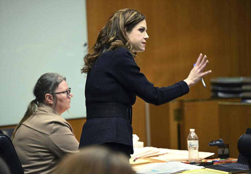 Defense Attorney Shannon Smith questions Jennifer Crumbley's former boss Andrew Smith, of Princeton Management, as he testifies during Crumbley's trial at Oakland County Courthouse, Tuesday, Jan. 30, 2024, in Pontiac, Mich. Crumbley, 45, is charged with involuntary manslaughter. Prosecutors say she and her husband were grossly negligent and could have prevented the four deaths if they had tended to their son’s mental health. They’re also accused of making a gun accessible at home. (Clarence Tabb Jr./Detroit News via AP)