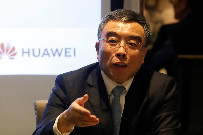 Liang Hua chairman of Huawei attends a news conference in Paris