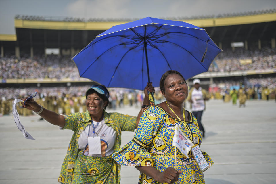 Worshipers greet Pope Francis at the Martyr Stadium in Kinshasa, Congo, Thursday Feb. 2, 2023. Pope Francis urged Congo’s young people to work for a peaceful and honest future on Thursday, getting a raucous response from a generation that has been particularly hard-hit by the country’s chronic poverty, corruption and conflict. (AP Photo/Moses Sawasawa)