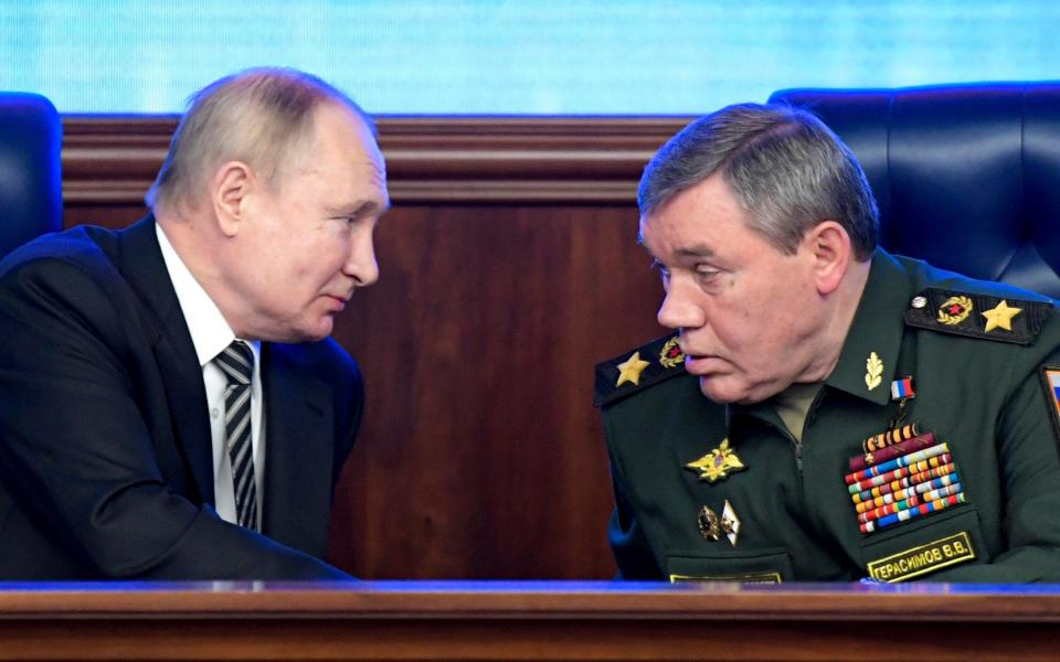 Russian President Vladimir Putin, left, and Russian General Staff Valery Gerasimov - Sputnik, Kremlin Pool Photo via AP, File