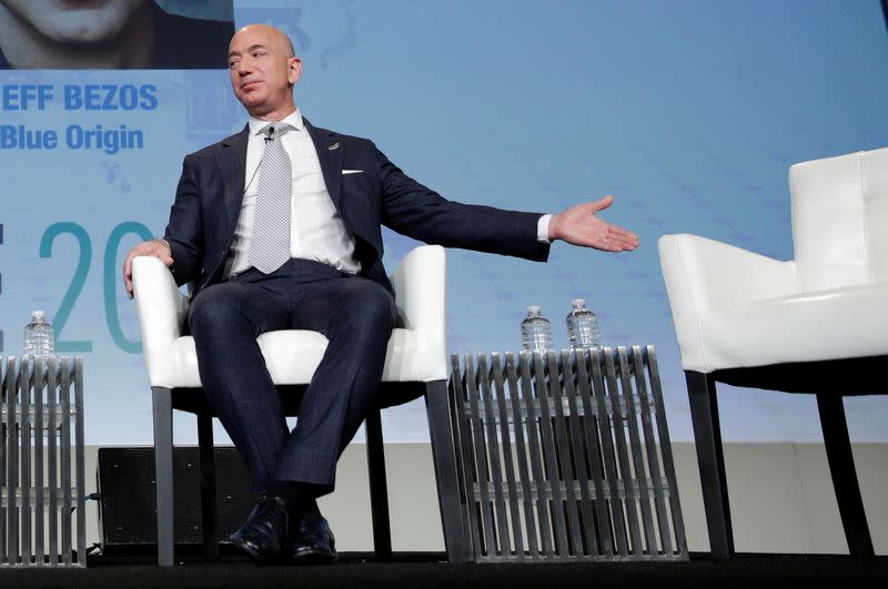 FILE PHOTO: Jeff Bezos, founder of Blue Origin and CEO of Amazon, speaks about the future plans of Blue Origin in Washington