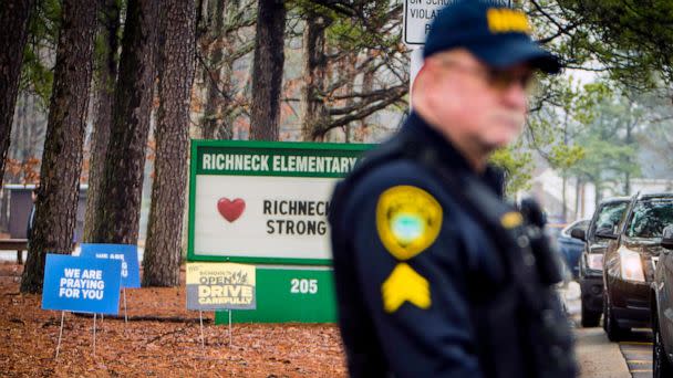 PHOTO: FILE - A Newport News police officer directs traffic at Richneck Elementary School in Newport News, Va., Jan. 30, 2023. (John C. Clark/AP, FILE)