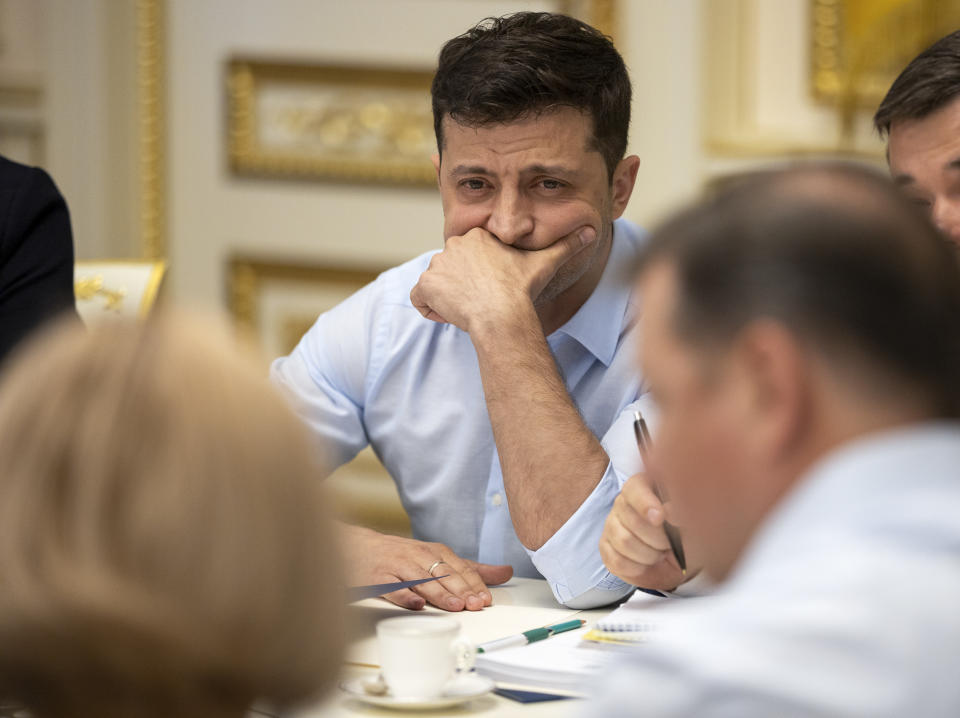 Ukrainian president Volodymyr Zelenskiy attends a meeting with the lawmakers in Kiev, Ukraine, Tuesday, May 21, 2019. Ukraine's new president on Tuesday ordered the dissolution of the nation's legislature and called a snap election in two months, hoping to ride the wave of his electoral success to get his supporters into parliament. (Ukrainian Presidential Press Office via AP)