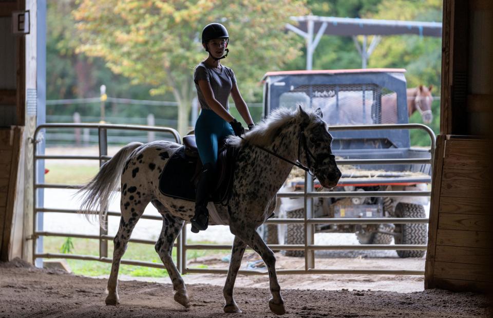 Rylee Hoerger, 13, practices on her appaloosa Montee at Hilltop Farms Equestrian Center, Thursday, Sept. 28, 2023, in the West Newton neighborhood of Indianapolis.