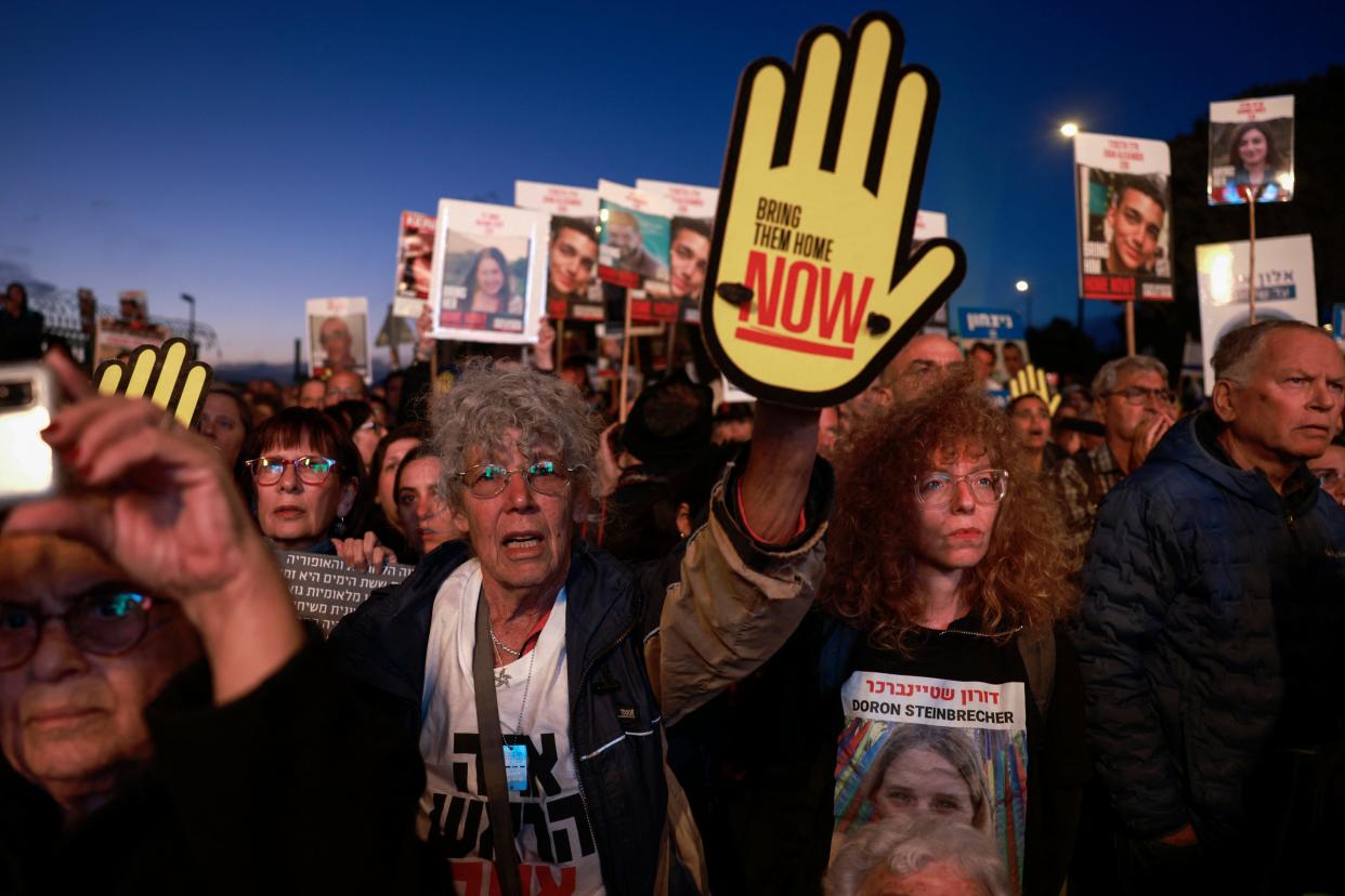 April 7, 2024 : Relatives and supporters of Israeli hostages held in Gaza since the October 7 attacks by Hamas militants lift placards during a demonstration in front of the Israeli parliament in Jerusalem amid the ongoing conflict in the Gaza Strip between Israel and the Palestinian militant Hamas movement.