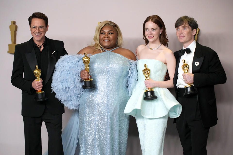 HOLLYWOOD, CALIFORNIA – MARCH 10: (L-R) Robert Downey Jr., winner of the Best Actor in a Supporting Role award for “Oppenheimer”, Da’Vine Joy Randolph, winner of the Best Supporting Actress award for “The Holdovers”, Emma Stone, winner of the Best Actress in a Leading Role award for “Poor Things”, and Cillian Murphy, winner of the Best Actor in a Leading Role award for “Oppenheimer”, onstage in the press room at the 96th Annual Academy Awards at Ovation Hollywood on March 10, 2024 in Hollywood, California. (Photo by Jeff Kravitz/FilmMagic)