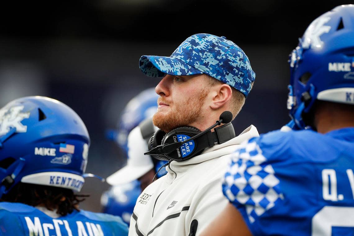After opting out of the Music City Bowl to prepare for the 2023 NFL Draft, Kentucky starting quarterback Will Levis watches from the sidelines as the Wildcats lost 21-0 to Iowa.
