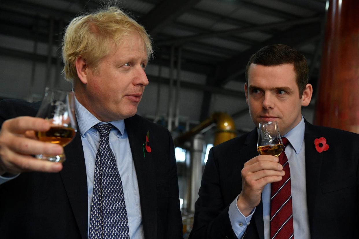 <p>Boris Johnson and the Scottish Conservative leader, Douglas Ross, during the 2019 general election campaign</p> (REUTERS)