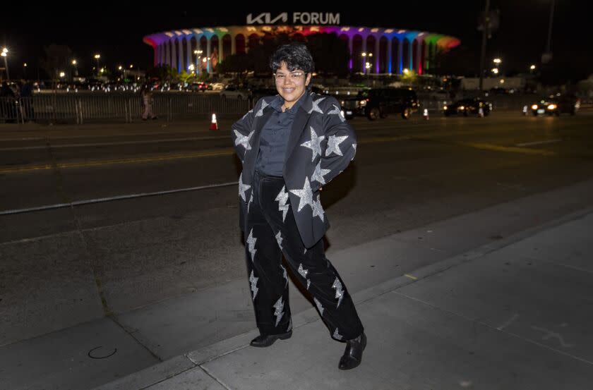 Inglewood, CA - October 23 Harry Styles fan Alondra "Ash" Sandoval poses for portraits across the street from the Kia Forum prior to Harry Styles concert Sunday, Oct. 23, 2022 in Inglewood, CA.(Brian van der Brug / Los Angeles Times)