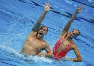 Christina Jones and Bill May of the U.S. perform in the synchronised swimming mixed duet technical final at the Aquatics World Championships in Kazan, Russia, July 26, 2015. REUTERS/Michael Dalder TPX IMAGES OF THE DAY