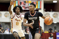 FILE - Imhotep's Justin Edwards (3) drives against a Cardinal Hayes player during a high school basketball game at the Hoophall Classic, Sunday, January 15, 2023, in Springfield, Mass. Edwards is positioned to be one of the top NBA draft prospects for next year. (AP Photo/Gregory Payan, File)