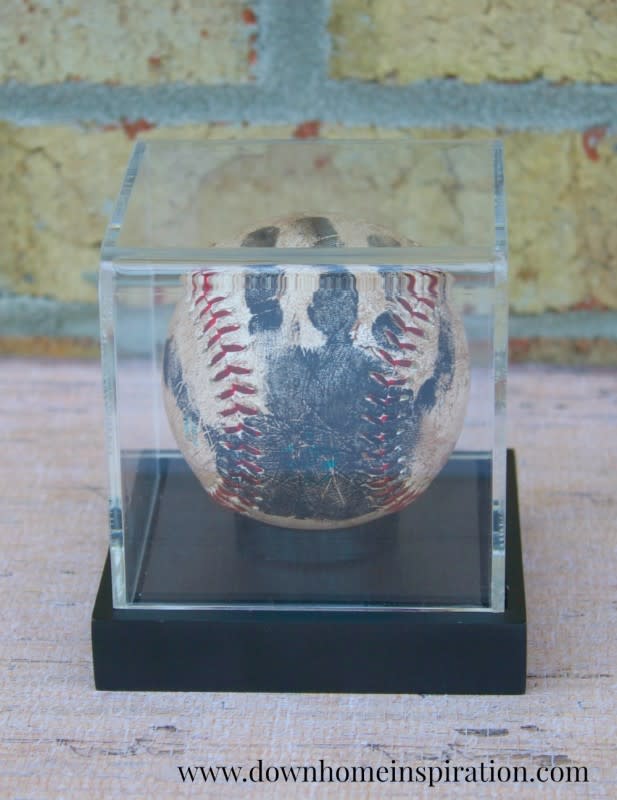 <p>Down Home Inspiration</p><p>The perfect gift for the perfect game of catch partner. <a href="https://www.downhomeinspiration.com/handprint-baseball-keepsake-perfect-fathers-day-perfectly-age-baseball/" rel="nofollow noopener" target="_blank" data-ylk="slk:Down Home Inspiration;elm:context_link;itc:0;sec:content-canvas" class="link ">Down Home Inspiration</a>’s take on baseball memorabilia is a fun activity for you and your tyke of all ages.</p>