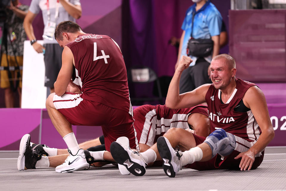 <p>TOKYO, JAPAN - JULY 28: Edgars Krumins of Team Latvia celebrates victory and winning the gold medal in the 3x3 Basketball competition on day five of the Tokyo 2020 Olympic Games at Aomi Urban Sports Park on July 28, 2021 in Tokyo, Japan. (Photo by Christian Petersen/Getty Images)</p> 