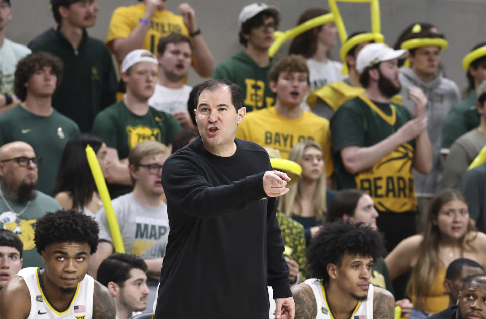 Baylor head coach Scott Drew reacts after a call against his team in the first half of an NCAA college basketball game against Iowa State, Saturday, Feb. 3, 2024, in Waco, Texas. (AP Photo/Rod Aydelotte)