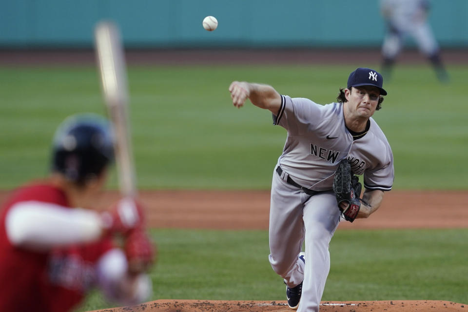 New York Yankees starting pitcher Gerrit Cole delivers to a Boston Red Sox batter during the first inning of a baseball game at Fenway Park, Friday, July 23, 2021, in Boston. (AP Photo/Elise Amendola)