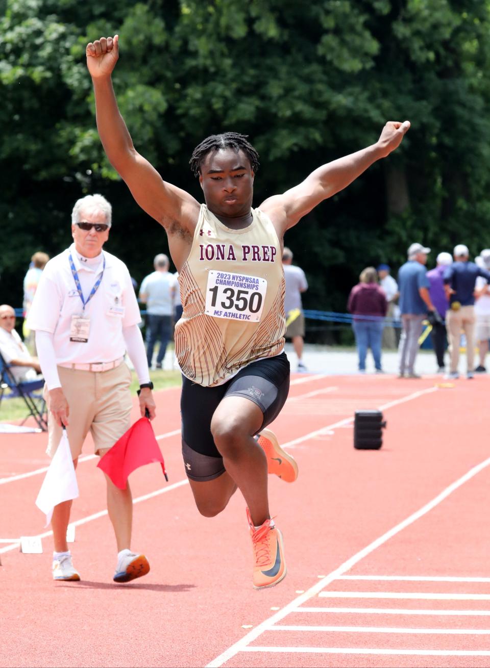 Justin Hargraves from Iona Prep competes in the boys triple jump during the New York State Track and Field Championships at Middletown High School, June 9, 2023.