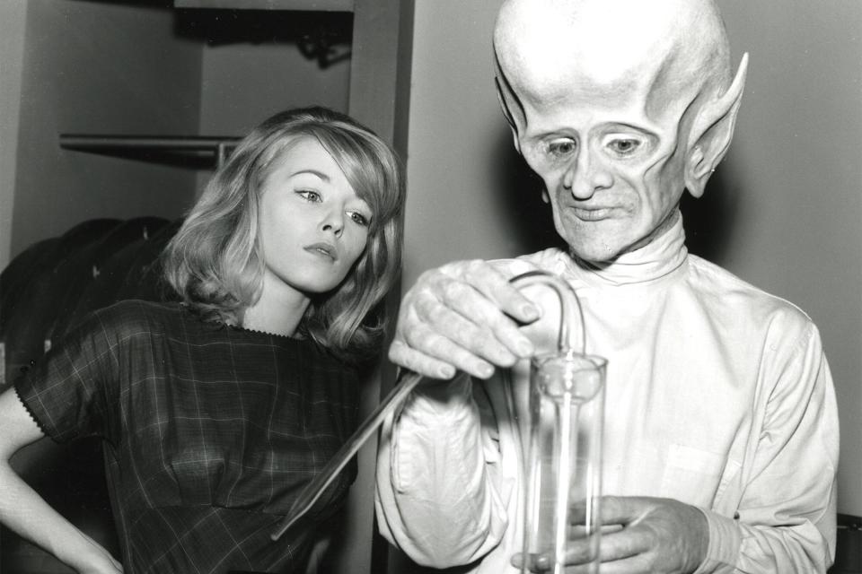 UNITED STATES - OCTOBER 14: THE OUTER LIMITS - "Sixth Finger" - 10/14/63, Jill Haworth (Cathy) and David McCallum (Gwyllim) on the Disney General Entertainment Content via Getty Images Television Network, sci-fi series, "The Outer Limits." A scientist experimenting with speeding up human evolution, hires on uneducated, but bright Gwyllim, from the nearby Welsh mining town. He proves a devoted lab assistant, but not content to stick to animal subjects, Gwyllim speeds up his own evolution, becoming a super genius with six fingers and a huge cranium., (Photo by ABC Photo Archives/Disney General Entertainment Content via Getty Images)