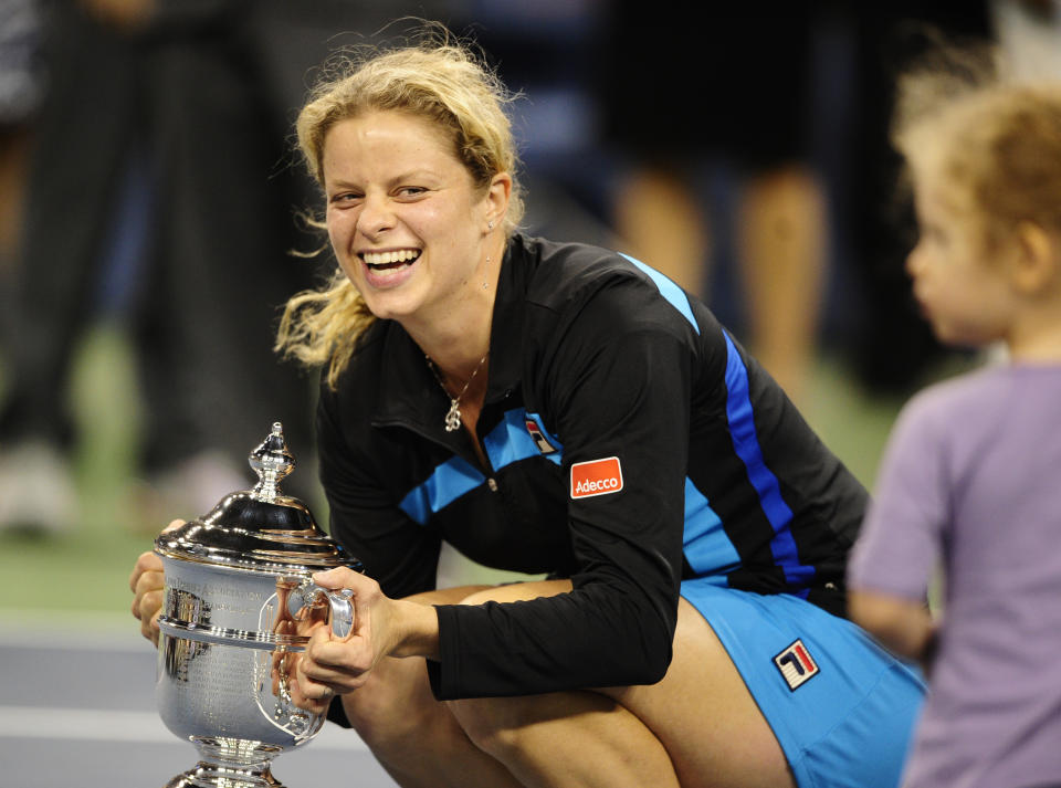 Kim Clijsters, pictured here celebrating with the trophy after winning the US Open in 2010.