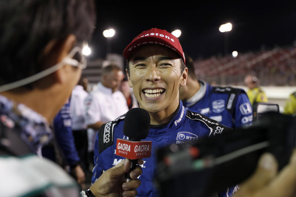 FILE - In a Saturday, Aug. 24, 2019 file photo, Takuma Sato smiles as he is interviewed after winning the IndyCar auto race at World Wide Technology Raceway in Madison, Ill. Takuma Sato will return to Rahal Letterman Lanigan Racing next season. Rahal said Saturday, Sept. 21, 2019 it had picked up the option for next year on Sato(AP Photo/Jeff Roberson, File)