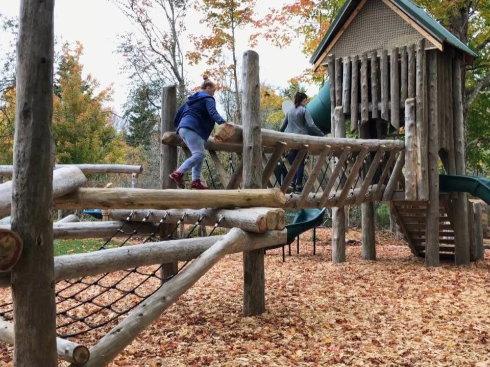 Kids use the new playground on Portapique Loop in Portapique, N.S., on Sunday. (CBC - image credit)