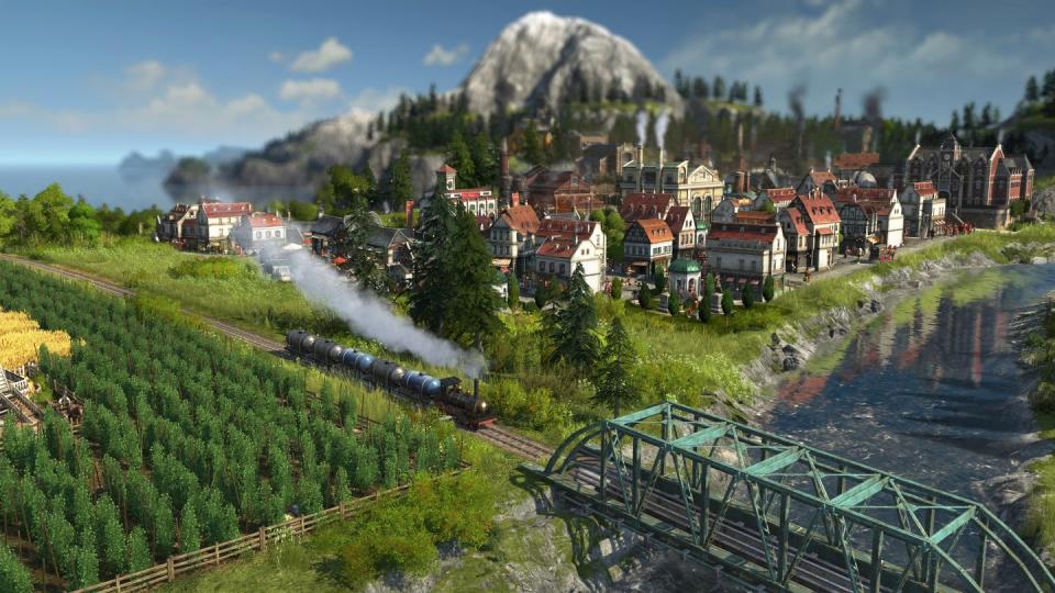 In der Stadt rauchen die Schlote, auf dem Land die Eisenbahnen - eine typische Szene aus «Anno 1800». Foto: Ubisoft