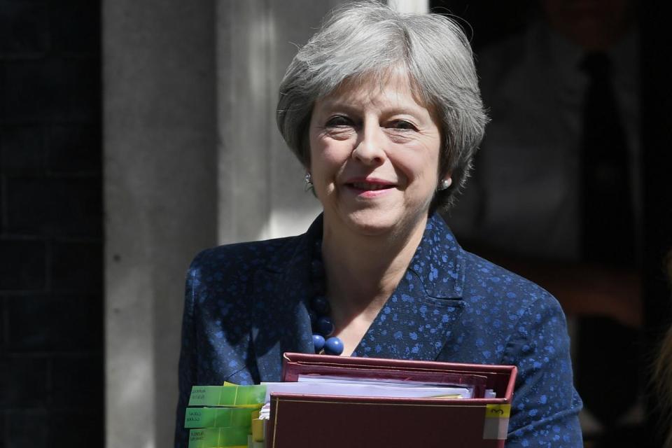 Under pressure: Prime Minister Theresa May leaves 10 Downing Street, London, on Wednesday (PA)