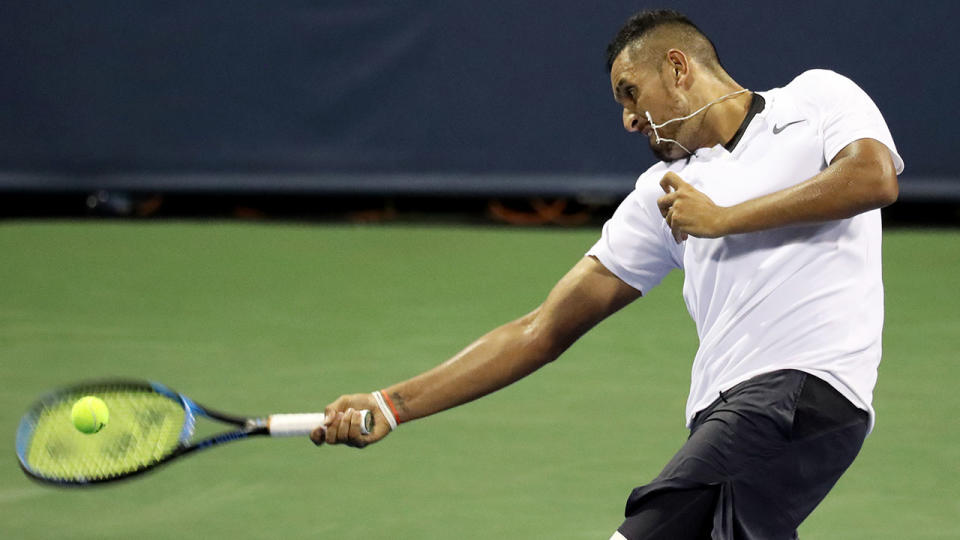 Nick Kyrgios blasts a ball into the stands during his second set meltdown. Pic: Getty