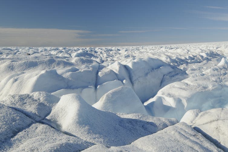 Crevices in an ice sheet.