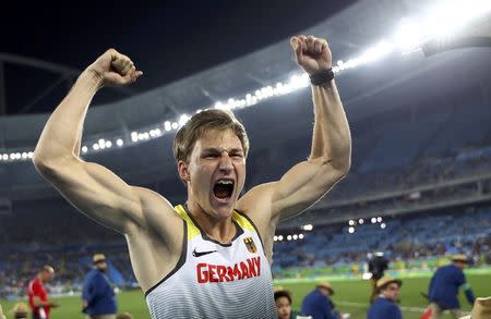 2016 Rio Olympics - Athletics - Final - Men's Javelin Throw Final - Olympic Stadium - Rio de Janeiro, Brazil - 20/08/2016. Thomas Rohler (GER) of Germany celebrates after winning gold. REUTERS/Kai Pfaffenbach