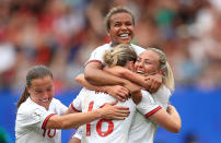 Ellen White of England celebrates with teammates after scoring her team's second goal during the 2019 FIFA Women's World Cup France Round Of 16 match between England and Cameroon at Stade du Hainaut on June 23, 2019 in Valenciennes, France. (Photo by Marc Atkins/Getty Images)