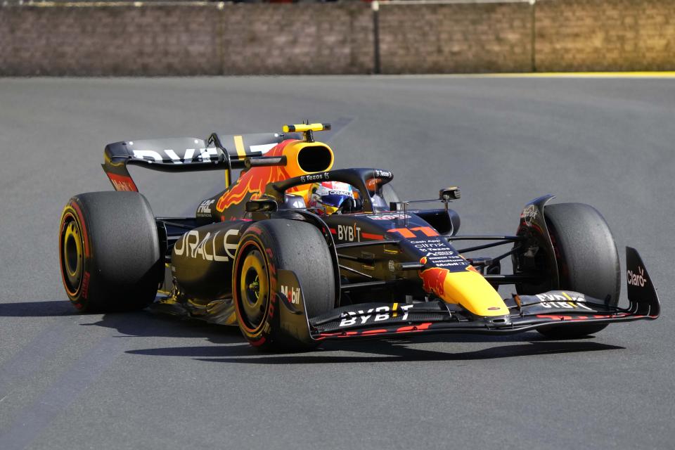 Red Bull driver Sergio Perez of Mexico steers his car during the first free practice at the Baku circuit, in Baku, Azerbaijan, Friday, June 10, 2022. The Formula One Grand Prix will be held on Sunday. (AP Photo/Sergei Grits)