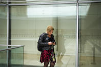 Tessa Ganserer a new lawmaker of the Green party and walks through the German parliament Bundestag building, the Reichstag Building, in Berlin, Tuesday, Sept. 28, 2021. Sunday's national election making Germany's lower house of parliament, or Bundestag, more diverse and inclusive than ever before. For the first time there are also two transgender women, at least three people of African descent and, after years of stagnation, the number of female lawmakers has gone up again as well. (AP Photo/Markus Schreiber)