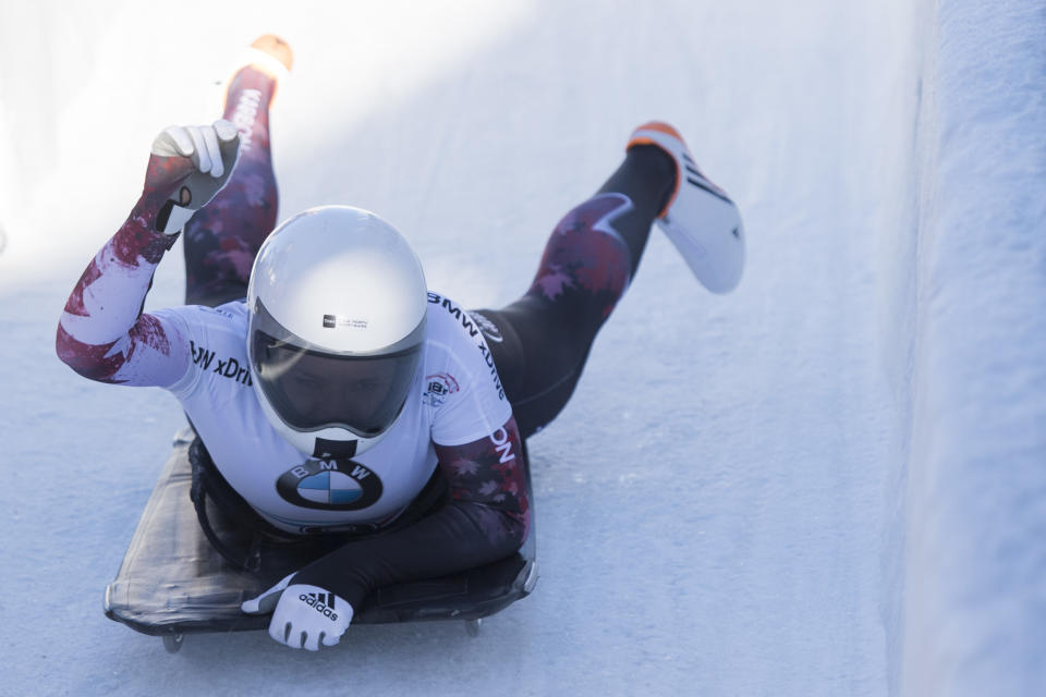 Winner Mirela Rahneva from Canada arrives in the finish area during the women's skeleton World Cup in St. Moritz, Switzerland, on Friday, Jan. 20, 2017. (Urs Flueeler/Keystone via AP)