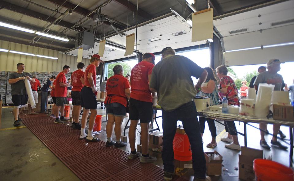 Servers try to keep up with demand Friday during the Shiloh Ox Roast.