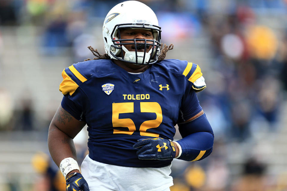 TOLEDO, OH - OCTOBER 17: Defensive tackle Marquise Moore #52 of the Toledo Rockets during the game against the Eastern Michigan Eagles at Glass Bowl on October 17, 2015 in Toledo, Ohio. (Photo by Andrew Weber/Getty Images)