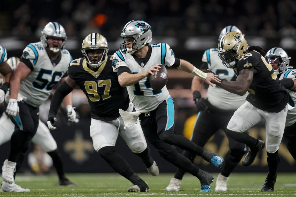 Carolina Panthers quarterback Sam Darnold scrambles during the second half an NFL football game between the Carolina Panthers and the New Orleans Saints in New Orleans, Sunday, Jan. 8, 2023. (AP Photo/Gerald Herbert)