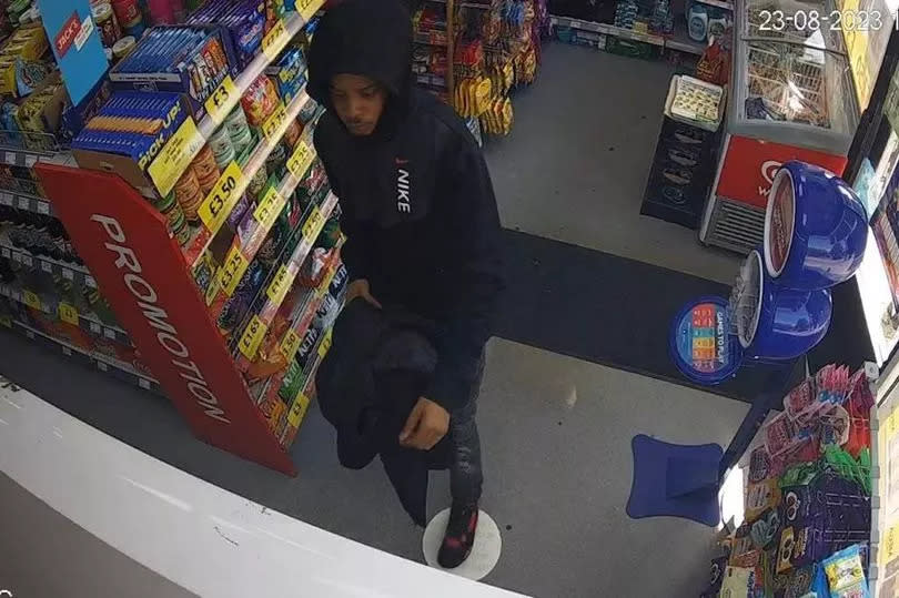 Tieran Carmody pictured on CCTV inside a convenience store after the murder